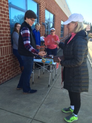Young Republicans hand out volunteer info on Super Tuesday.