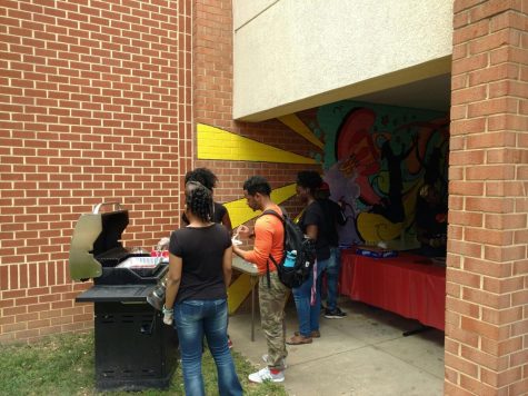 Students prepare food. 