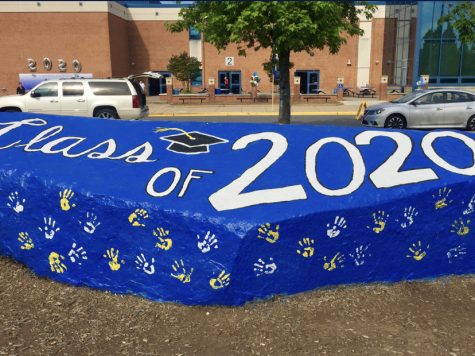 The famous rock in front of the school was painted for the graduation