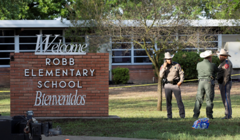 Officers stand outside of Robb Elementary School in Uvalde, Texas. Credit: Nuri Vallbona/Reuters