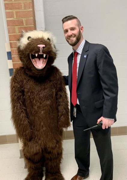 Mr. McMahon posing with the Wolverine at Back to School Night