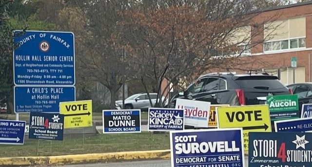 The election action moves to the normal voting locations after early voting was held at the Government Center. There are many signs to encourage voters.