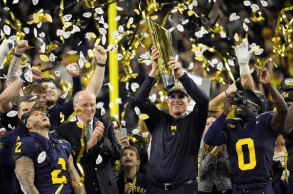 Michigan hoists their first national championship trophy in 30 years 
