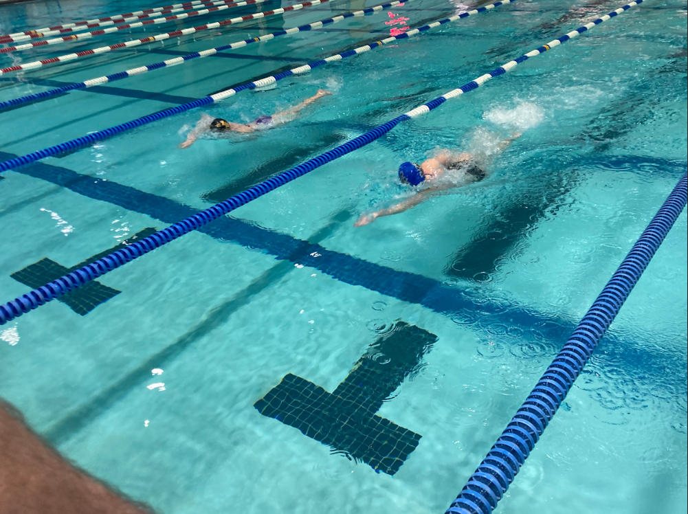 Swimmers practice as their temporary home, George Washington Recreation Center