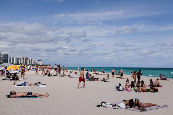 Miami Beach officials would be happy if revelers spent time sunning on the beach and enjoying the water. Photo of Miami Beach - REUTERS