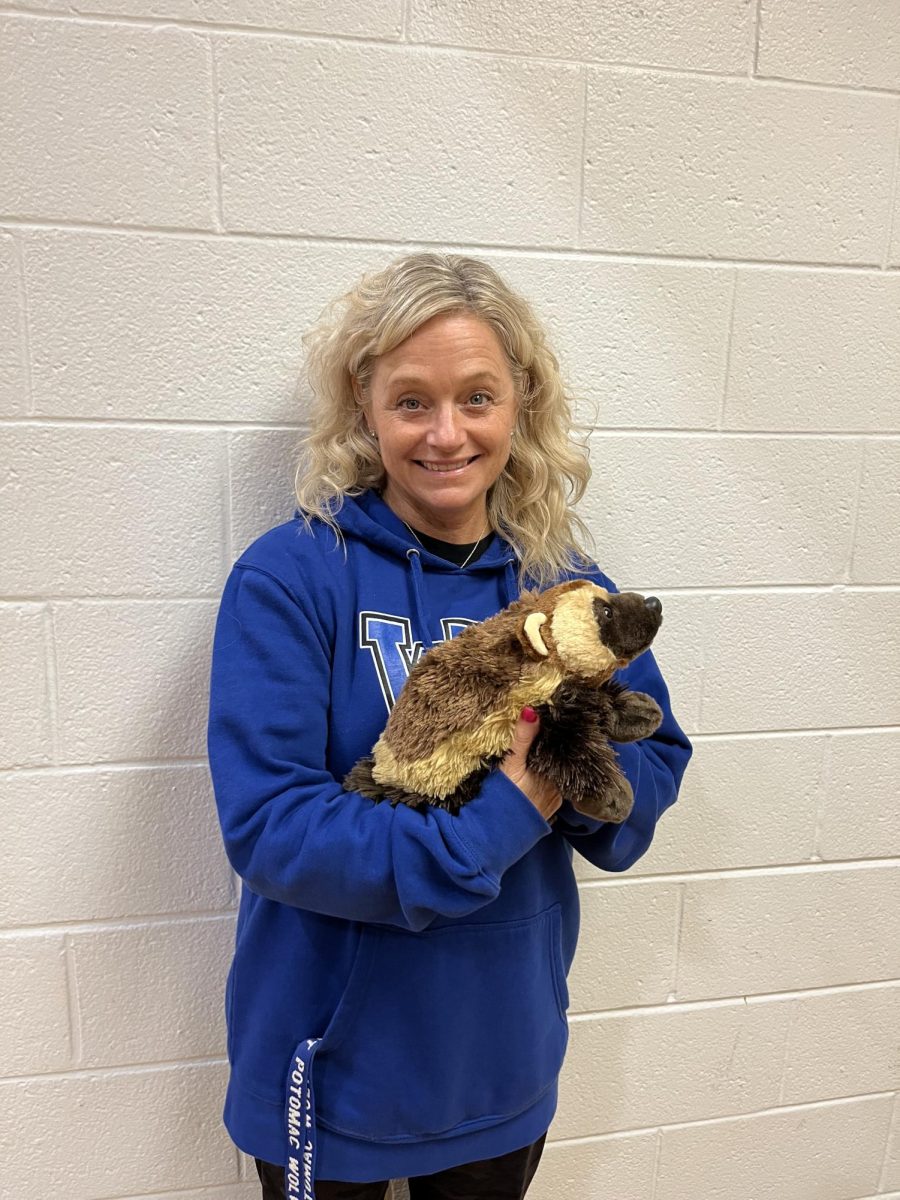 Ms. Vasques holding her wolverine stuffed animal