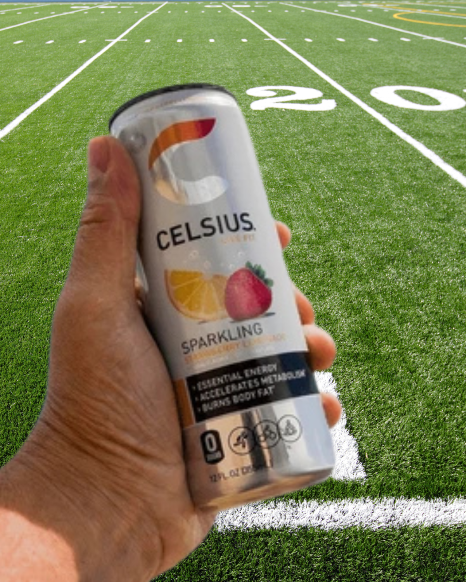 An athlete poses with a Celsius before a game.