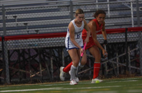 Genovieve Riley dribbles towards the goal in a tough 0-2 loss against Annandale.   