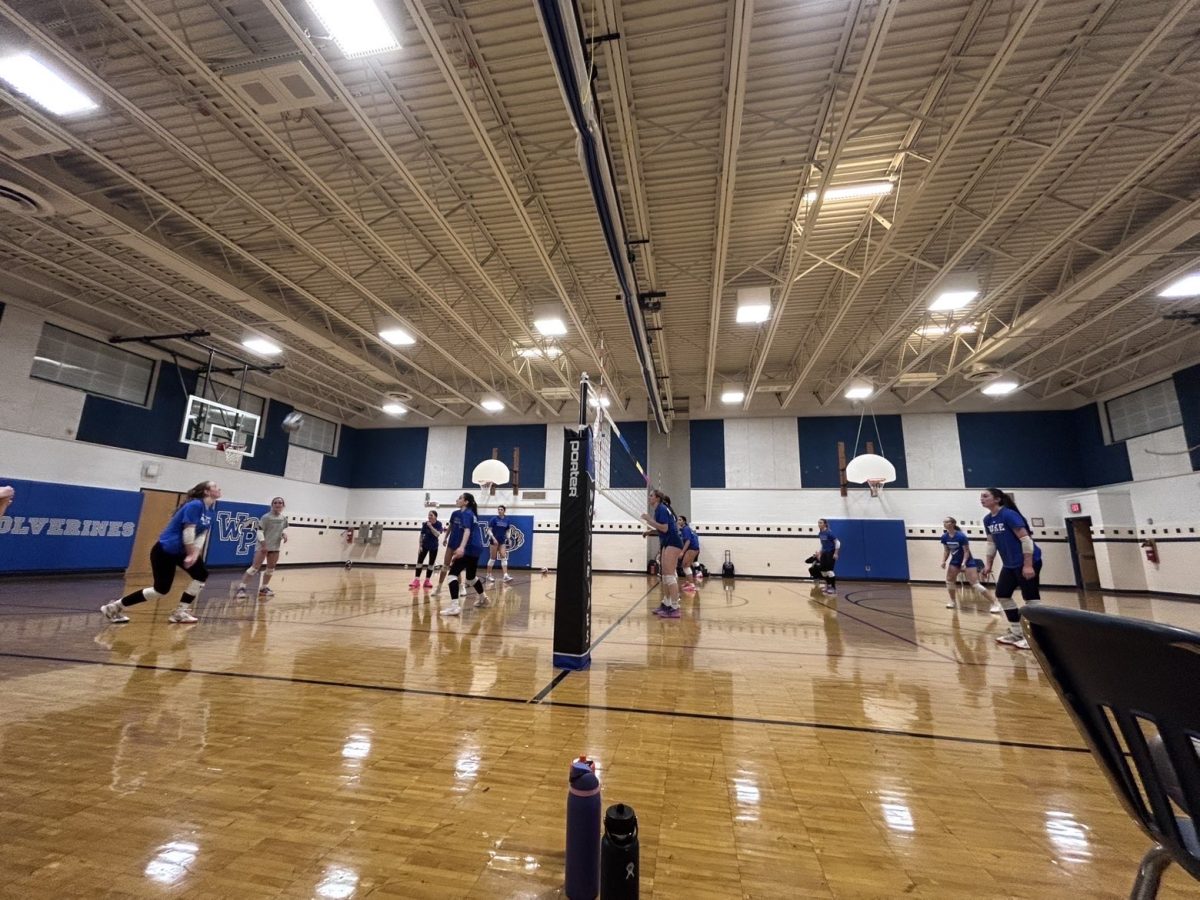 The West Po Girls Volleyball Team practices ahead of the Regional Final game against West Springfield.