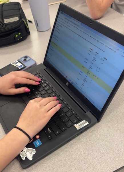 A West Po student looking at available courses through the course catalog.