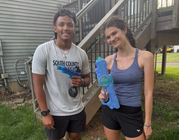 My target, Oliver Andrzejuk-Nkoulou, and I holding our water guns together after my elimination. 