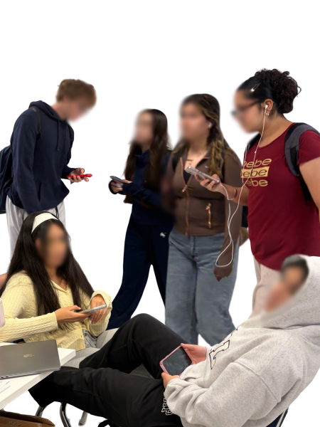 Students can be seen in classrooms and the halls using their cellphones, in violation of current FCPS policy. Faces blurred to protect student identities.